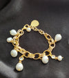 Gold chain and pearls bracelet