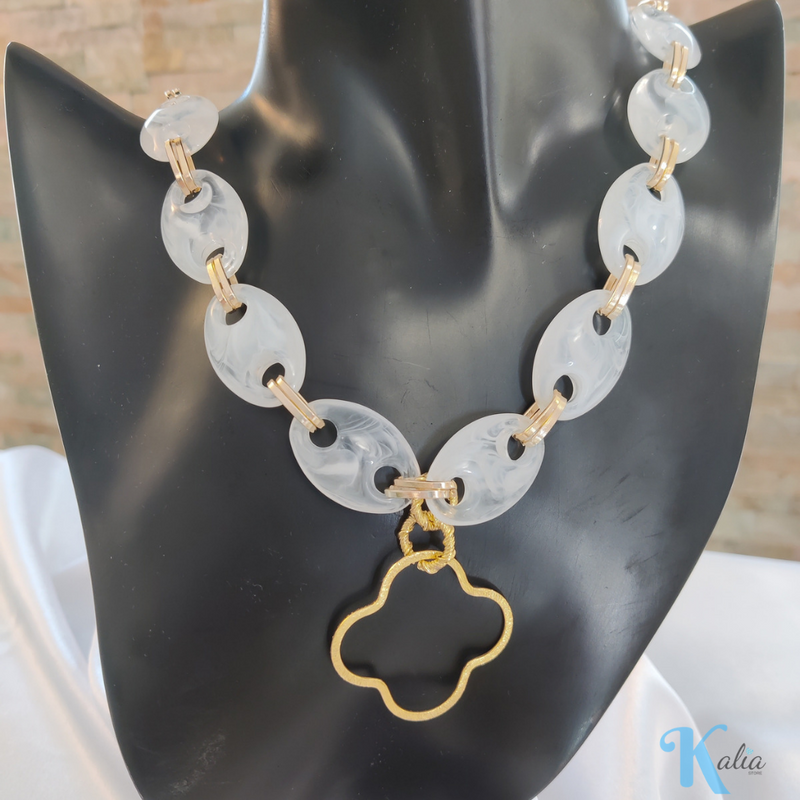 white stone and gold necklace